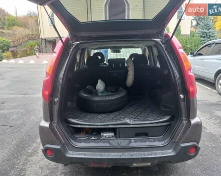 Фиолетовый Ниссан ИксТрейл, объемом двигателя 2 л и пробегом 265 тыс. км за 9200 $, фото 5 на Automoto.ua