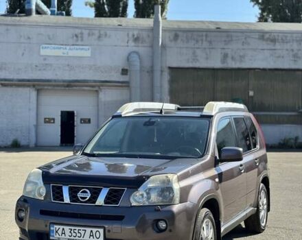 Фиолетовый Ниссан ИксТрейл, объемом двигателя 2 л и пробегом 197 тыс. км за 10000 $, фото 1 на Automoto.ua