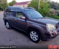 Фиолетовый Ниссан ИксТрейл, объемом двигателя 2 л и пробегом 180 тыс. км за 10700 $, фото 3 на Automoto.ua
