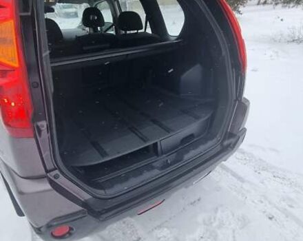 Фиолетовый Ниссан ИксТрейл, объемом двигателя 2 л и пробегом 237 тыс. км за 9100 $, фото 4 на Automoto.ua