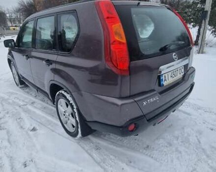 Фиолетовый Ниссан ИксТрейл, объемом двигателя 2 л и пробегом 237 тыс. км за 9100 $, фото 5 на Automoto.ua