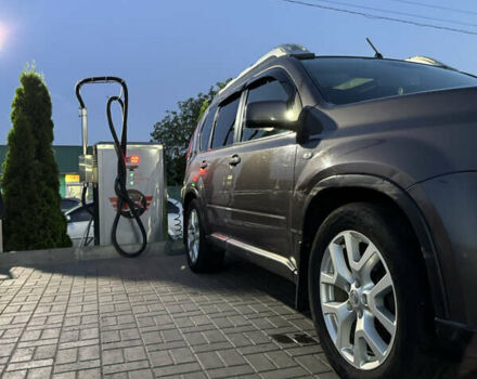 Фіолетовий Ніссан ІксТрейл, об'ємом двигуна 2 л та пробігом 296 тис. км за 12600 $, фото 10 на Automoto.ua