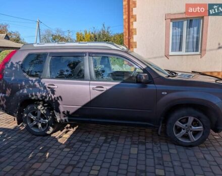 Фиолетовый Ниссан ИксТрейл, объемом двигателя 2 л и пробегом 185 тыс. км за 11000 $, фото 3 на Automoto.ua