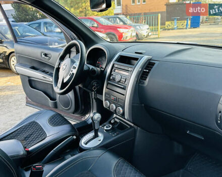 Фиолетовый Ниссан ИксТрейл, объемом двигателя 2 л и пробегом 190 тыс. км за 10800 $, фото 34 на Automoto.ua