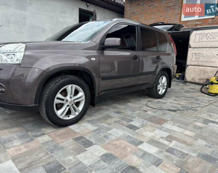 Фиолетовый Ниссан ИксТрейл, объемом двигателя 2 л и пробегом 161 тыс. км за 11500 $, фото 1 на Automoto.ua