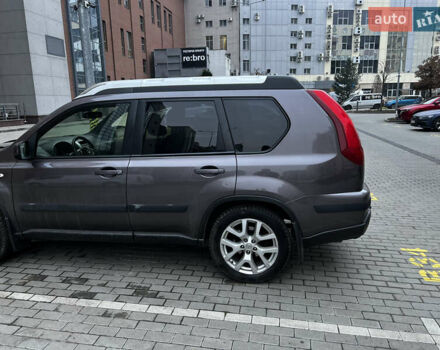 Фиолетовый Ниссан ИксТрейл, объемом двигателя 2 л и пробегом 253 тыс. км за 11000 $, фото 3 на Automoto.ua