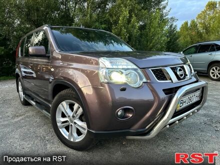 Фиолетовый Ниссан ИксТрейл, объемом двигателя 2.5 л и пробегом 124 тыс. км за 11500 $, фото 1 на Automoto.ua