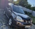 Коричневий Ніссан ІксТрейл, об'ємом двигуна 2 л та пробігом 248 тис. км за 10500 $, фото 1 на Automoto.ua