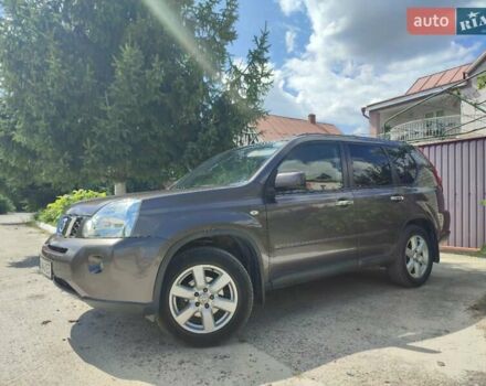 Коричневый Ниссан ИксТрейл, объемом двигателя 2 л и пробегом 238 тыс. км за 9450 $, фото 1 на Automoto.ua