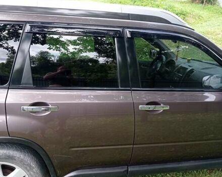 Коричневый Ниссан ИксТрейл, объемом двигателя 2 л и пробегом 285 тыс. км за 8600 $, фото 1 на Automoto.ua