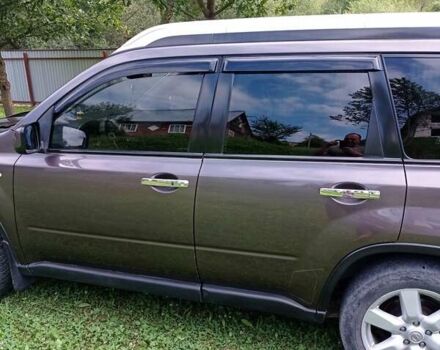 Коричневый Ниссан ИксТрейл, объемом двигателя 2 л и пробегом 285 тыс. км за 8600 $, фото 2 на Automoto.ua