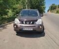 Коричневий Ніссан ІксТрейл, об'ємом двигуна 2.49 л та пробігом 248 тис. км за 10000 $, фото 1 на Automoto.ua