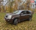 Коричневый Ниссан ИксТрейл, объемом двигателя 2 л и пробегом 246 тыс. км за 8999 $, фото 2 на Automoto.ua