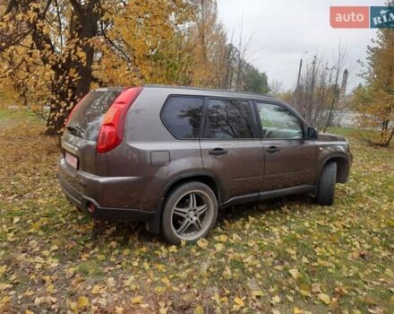 Коричневый Ниссан ИксТрейл, объемом двигателя 2 л и пробегом 246 тыс. км за 8999 $, фото 4 на Automoto.ua