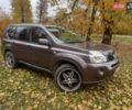 Коричневий Ніссан ІксТрейл, об'ємом двигуна 2 л та пробігом 246 тис. км за 8499 $, фото 1 на Automoto.ua