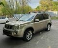 Коричневий Ніссан ІксТрейл, об'ємом двигуна 2 л та пробігом 375 тис. км за 4601 $, фото 1 на Automoto.ua
