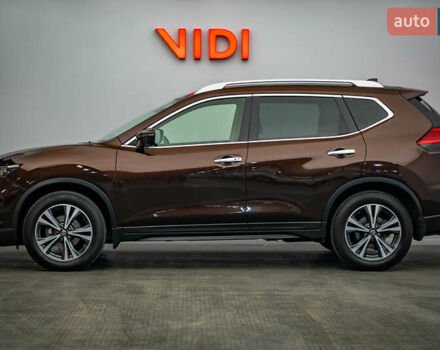 Коричневый Ниссан ИксТрейл, объемом двигателя 2.5 л и пробегом 113 тыс. км за 24963 $, фото 2 на Automoto.ua