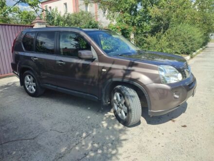 Коричневый Ниссан ИксТрейл, объемом двигателя 2 л и пробегом 238 тыс. км за 9300 $, фото 1 на Automoto.ua