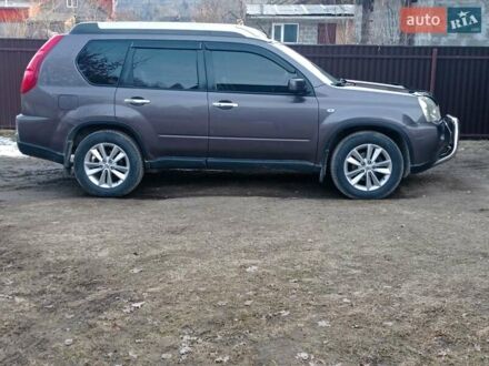 Коричневый Ниссан ИксТрейл, объемом двигателя 2 л и пробегом 285 тыс. км за 8600 $, фото 1 на Automoto.ua