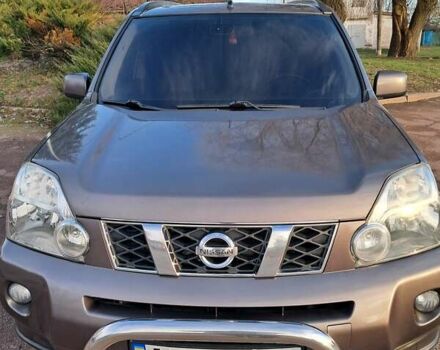Коричневий Ніссан ІксТрейл, об'ємом двигуна 2 л та пробігом 294 тис. км за 10600 $, фото 1 на Automoto.ua