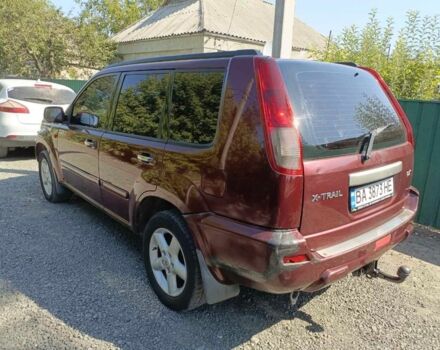 Красный Ниссан ИксТрейл, объемом двигателя 2.2 л и пробегом 400 тыс. км за 4700 $, фото 2 на Automoto.ua