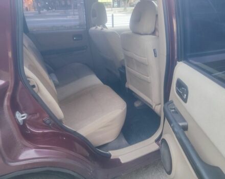 Красный Ниссан ИксТрейл, объемом двигателя 2 л и пробегом 342 тыс. км за 3999 $, фото 5 на Automoto.ua