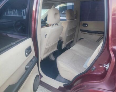 Красный Ниссан ИксТрейл, объемом двигателя 2 л и пробегом 342 тыс. км за 3999 $, фото 4 на Automoto.ua