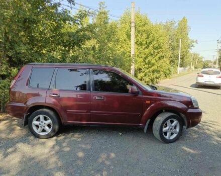 Красный Ниссан ИксТрейл, объемом двигателя 2.2 л и пробегом 400 тыс. км за 4700 $, фото 4 на Automoto.ua