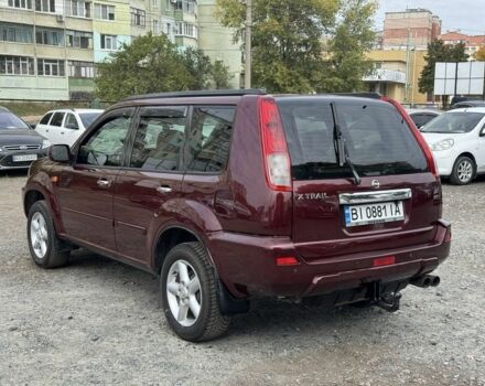 Красный Ниссан ИксТрейл, объемом двигателя 2 л и пробегом 220 тыс. км за 6000 $, фото 2 на Automoto.ua