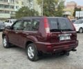 Красный Ниссан ИксТрейл, объемом двигателя 2 л и пробегом 220 тыс. км за 6000 $, фото 2 на Automoto.ua