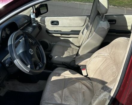 Красный Ниссан ИксТрейл, объемом двигателя 2.2 л и пробегом 421 тыс. км за 4000 $, фото 2 на Automoto.ua