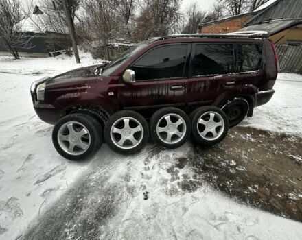 Красный Ниссан ИксТрейл, объемом двигателя 2.2 л и пробегом 421 тыс. км за 4000 $, фото 7 на Automoto.ua