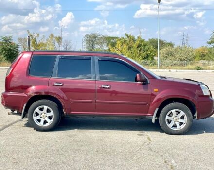 Красный Ниссан ИксТрейл, объемом двигателя 2.2 л и пробегом 337 тыс. км за 3599 $, фото 4 на Automoto.ua