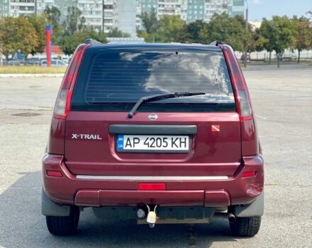 Красный Ниссан ИксТрейл, объемом двигателя 2.2 л и пробегом 337 тыс. км за 3599 $, фото 7 на Automoto.ua