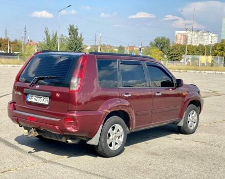 Красный Ниссан ИксТрейл, объемом двигателя 2.2 л и пробегом 337 тыс. км за 3599 $, фото 6 на Automoto.ua