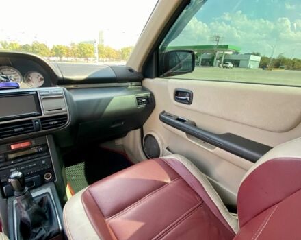 Красный Ниссан ИксТрейл, объемом двигателя 2.2 л и пробегом 337 тыс. км за 3599 $, фото 9 на Automoto.ua