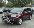 Красный Ниссан ИксТрейл, объемом двигателя 2 л и пробегом 220 тыс. км за 6000 $, фото 1 на Automoto.ua