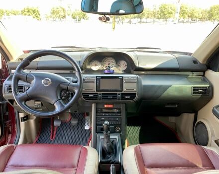 Красный Ниссан ИксТрейл, объемом двигателя 2.2 л и пробегом 337 тыс. км за 3599 $, фото 8 на Automoto.ua