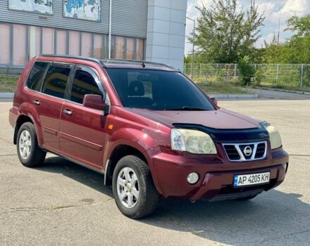 Красный Ниссан ИксТрейл, объемом двигателя 2.2 л и пробегом 337 тыс. км за 3599 $, фото 2 на Automoto.ua