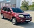 Красный Ниссан ИксТрейл, объемом двигателя 2.2 л и пробегом 337 тыс. км за 3599 $, фото 2 на Automoto.ua