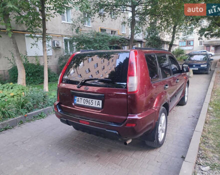 Красный Ниссан ИксТрейл, объемом двигателя 2 л и пробегом 342 тыс. км за 6000 $, фото 9 на Automoto.ua