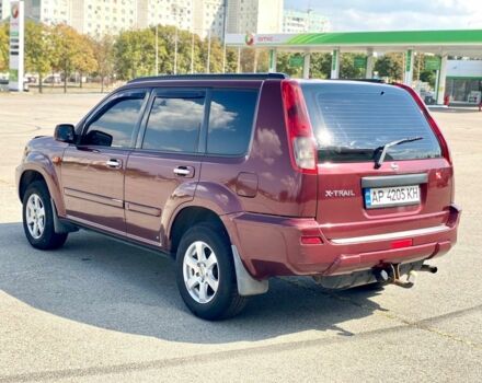 Красный Ниссан ИксТрейл, объемом двигателя 2.2 л и пробегом 337 тыс. км за 3599 $, фото 5 на Automoto.ua