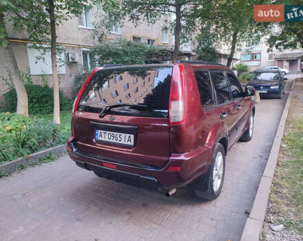 Красный Ниссан ИксТрейл, объемом двигателя 2 л и пробегом 342 тыс. км за 6000 $, фото 6 на Automoto.ua