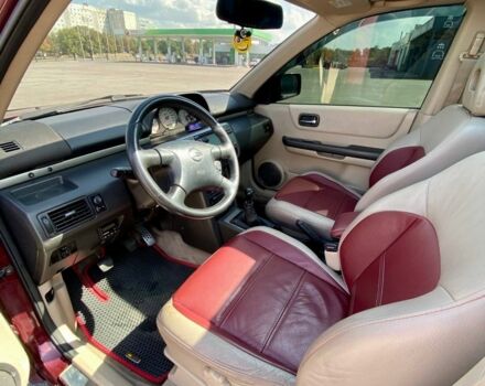 Красный Ниссан ИксТрейл, объемом двигателя 2.2 л и пробегом 337 тыс. км за 3599 $, фото 11 на Automoto.ua