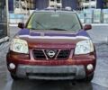 Червоний Ніссан ІксТрейл, об'ємом двигуна 2 л та пробігом 250 тис. км за 4499 $, фото 1 на Automoto.ua