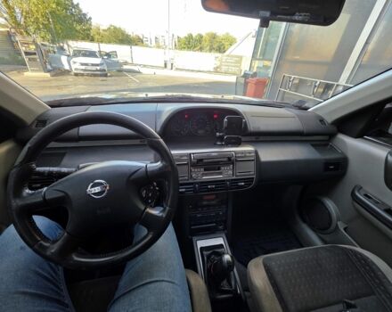 Червоний Ніссан ІксТрейл, об'ємом двигуна 2 л та пробігом 250 тис. км за 4499 $, фото 13 на Automoto.ua