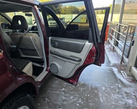 Червоний Ніссан ІксТрейл, об'ємом двигуна 2 л та пробігом 250 тис. км за 4499 $, фото 8 на Automoto.ua