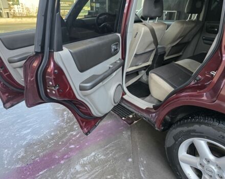 Червоний Ніссан ІксТрейл, об'ємом двигуна 2 л та пробігом 250 тис. км за 4499 $, фото 11 на Automoto.ua