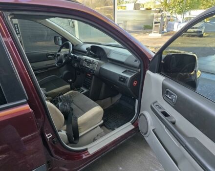 Червоний Ніссан ІксТрейл, об'ємом двигуна 2 л та пробігом 250 тис. км за 4499 $, фото 6 на Automoto.ua