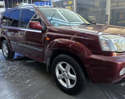 Червоний Ніссан ІксТрейл, об'ємом двигуна 2 л та пробігом 250 тис. км за 4499 $, фото 2 на Automoto.ua